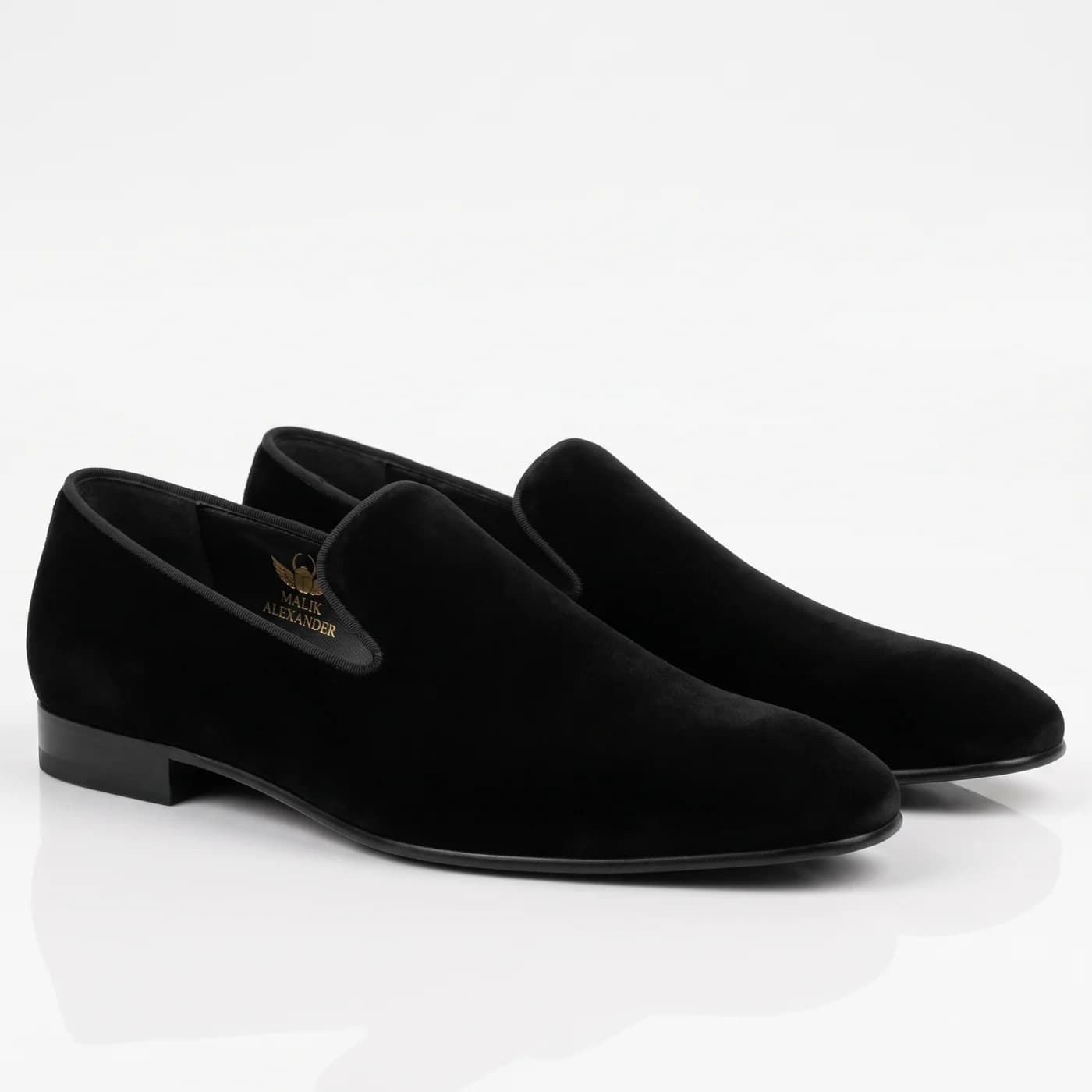 A pair of black smoking slippers