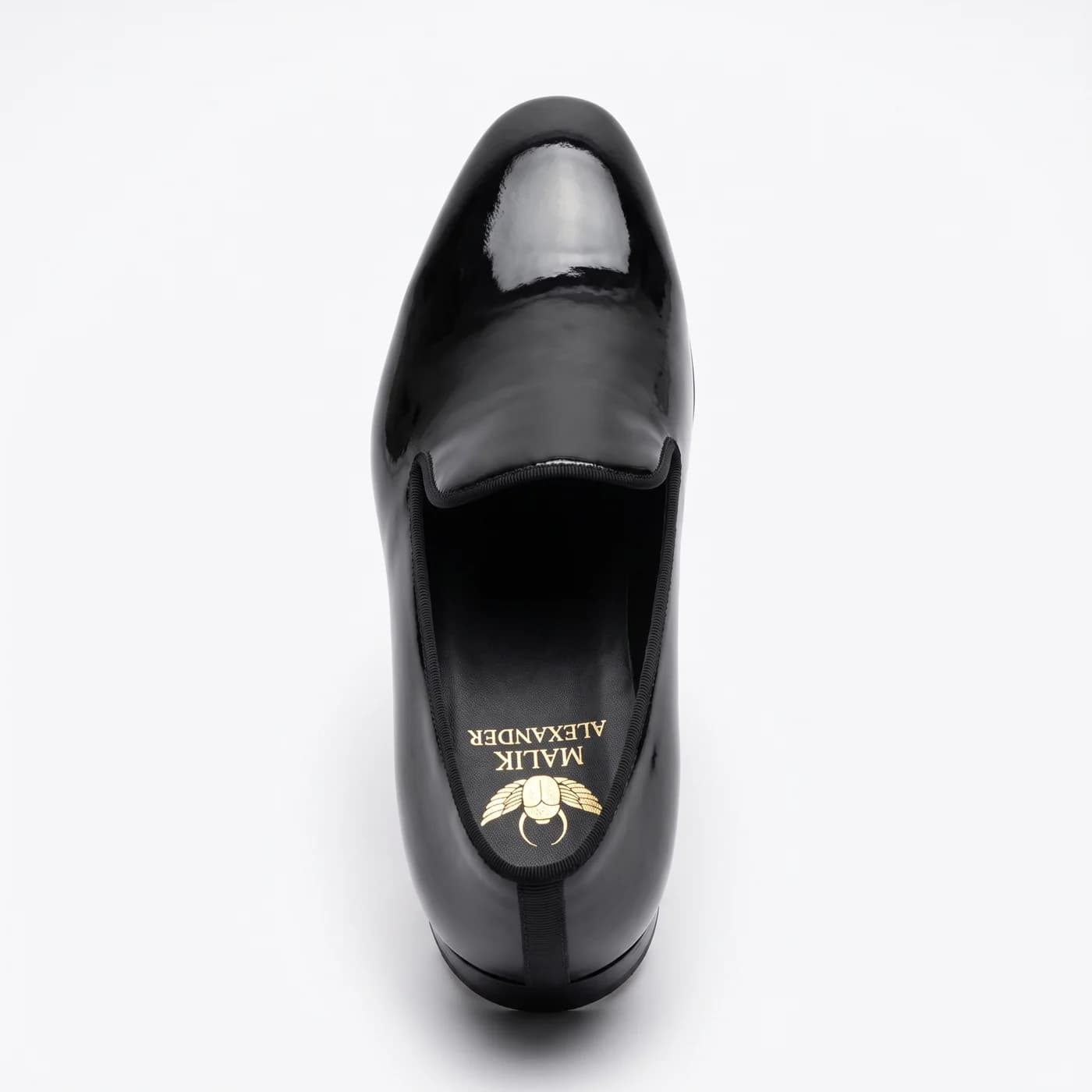 Patent slipper, black, from above, the Malik Alexander logo in gold on the black insole