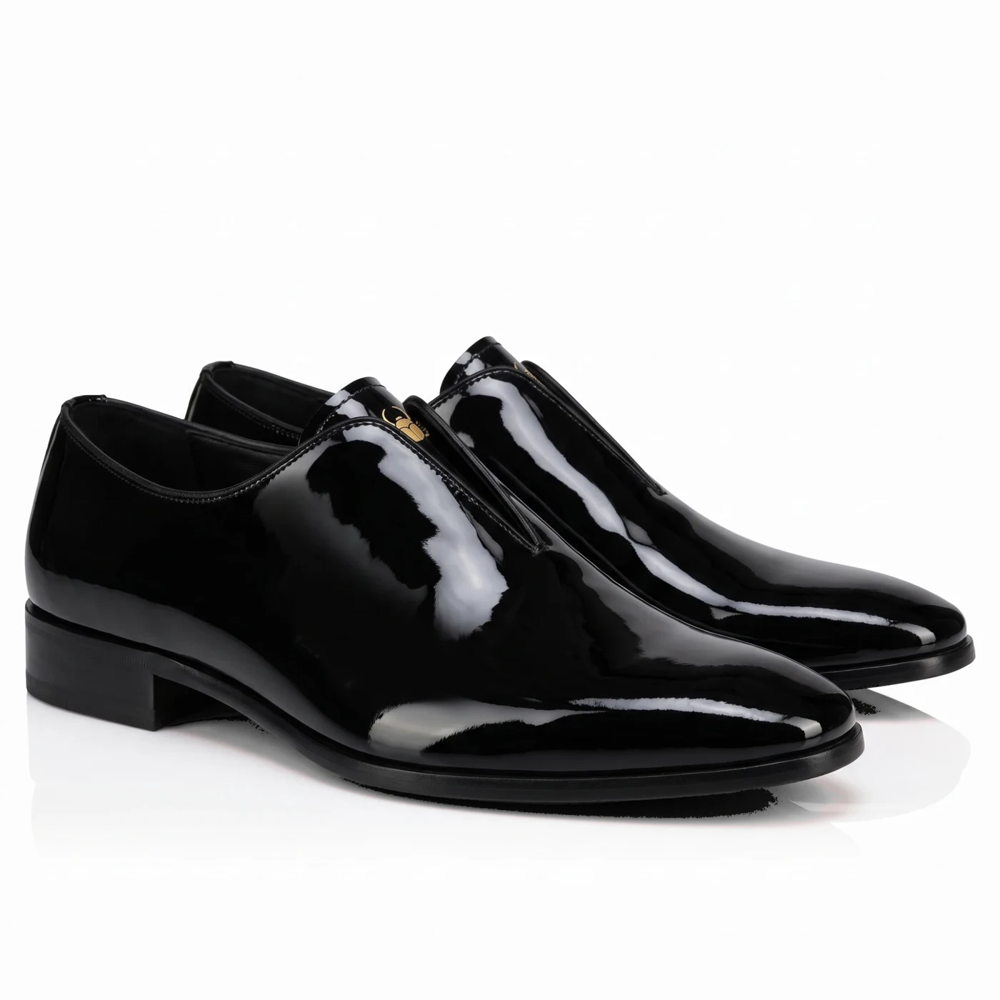 Pair of black patent leather slip-ons