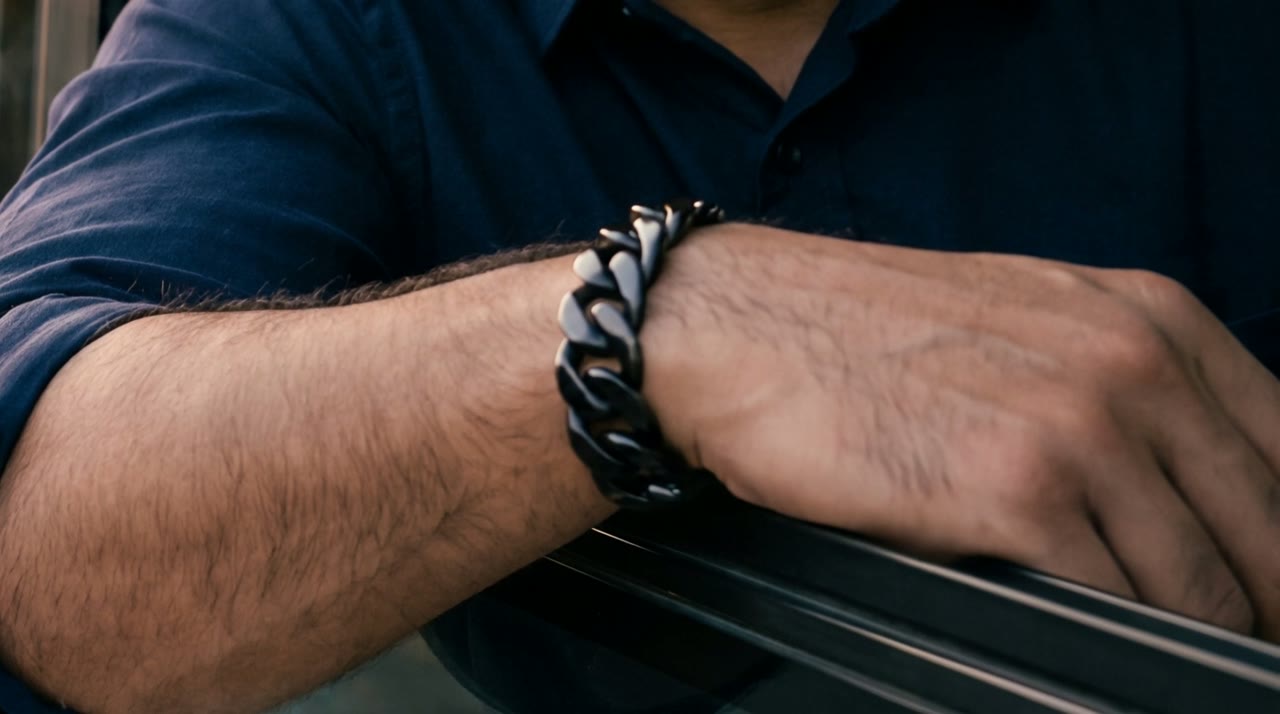 Obelisk Curb Cuff worn in the scene